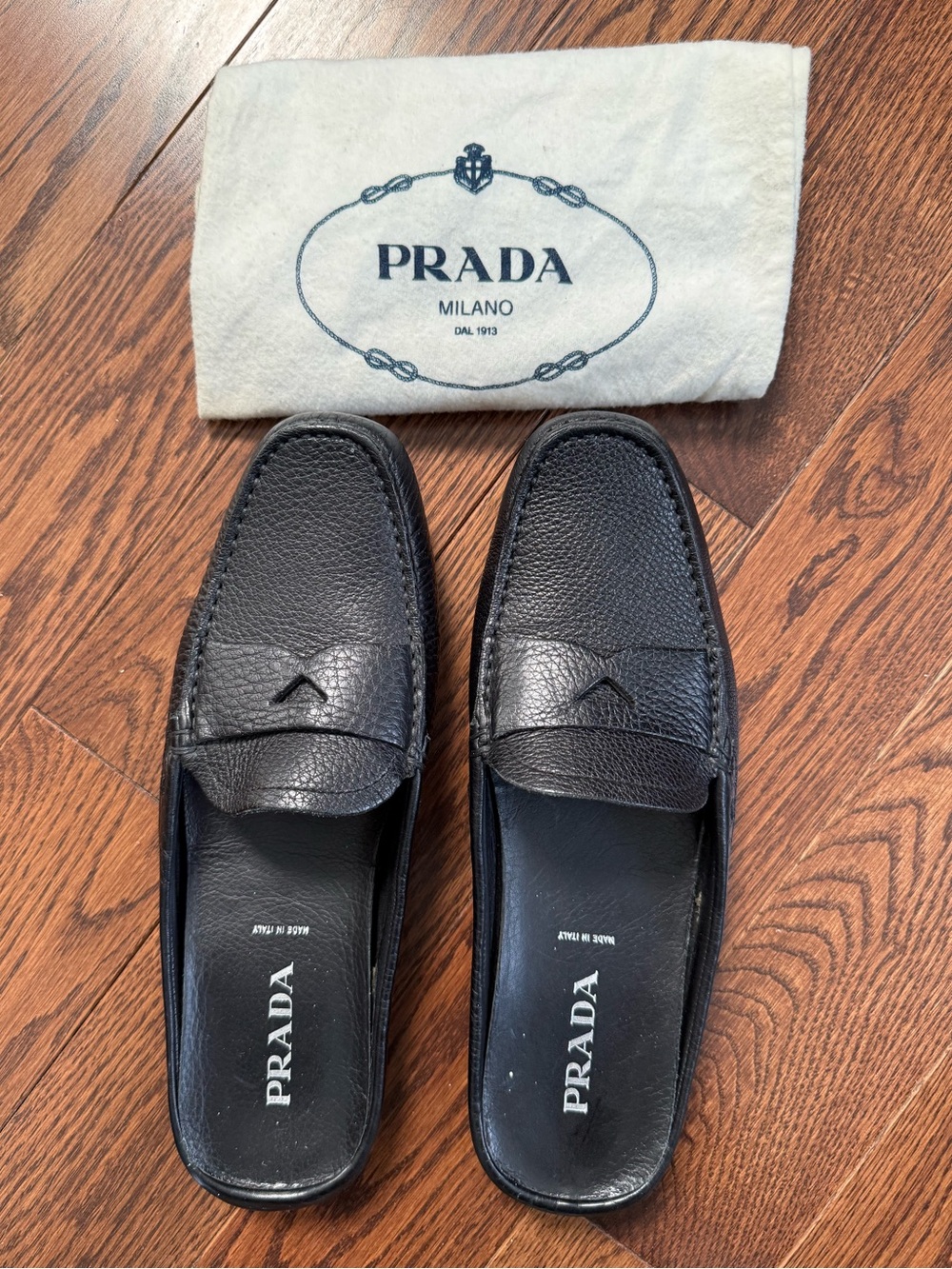 Prada Black Pebbled Leather Slip-On Loafers
